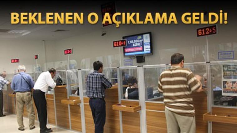 emlak vergisi ödemek için sıra bekleyen insanlar